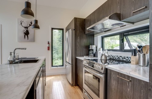 Sainte-Emelie Ski Chalet | The Rebel Chipmunk, waterfront with spa