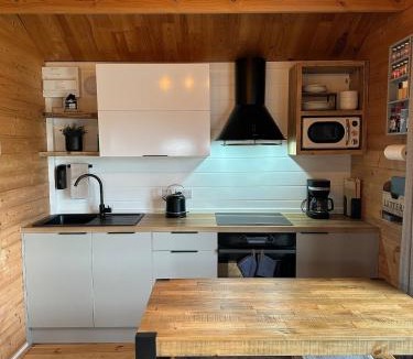 Hawkinge House | The Cabin log fire cosy home