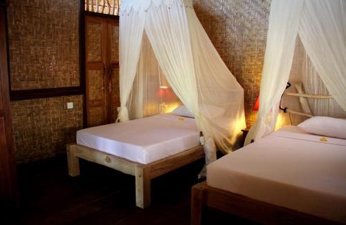 Batu Bolong Resort | The Calmtree Bungalows