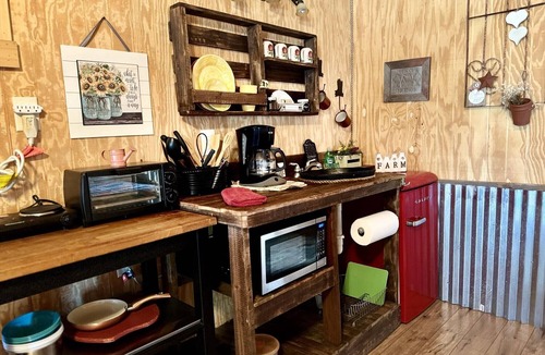 Mountain Home Cabin | The Carriage House Cabin- Texas Hill Country Western-themed cabin for 4 in the woods near Kerrville & Fredericksburg