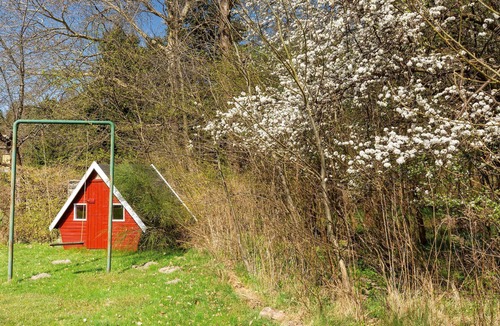 Holbaek House | The charming cottage is located by the forest Bognæs Skov, a good destination for hiking.
