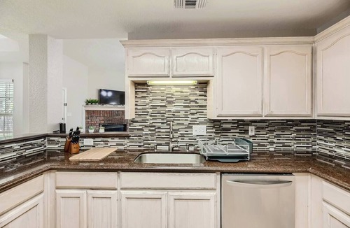 Georgetown House | The Clover House Georgetown is the perfect getaway for families or workers seeking a home base while in town. This charming retreat features a warm, inviting interior with modern amenities, a fully equipped kitchen, and comfortable living spaces.