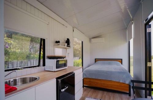 Waimangaroa House | The Coast 2 by Tiny Away