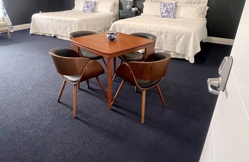 Hector House | The Cobalt Suite at Diamond on Seneca: Two King Beds with Bay Window