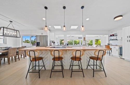 Venetian Way House | The Cocoa Plum - A Quiet Riverfront Pool Home Near Beach