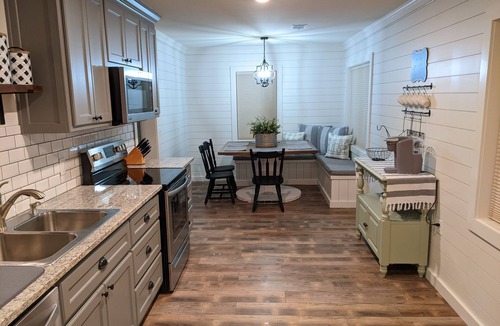 Roland House | The Corner Cottage with Private Fishing Pond