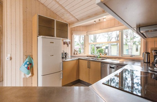 Store Kongsmark House | The cottage in Stillinge Strand has a kitchen open to the living room.