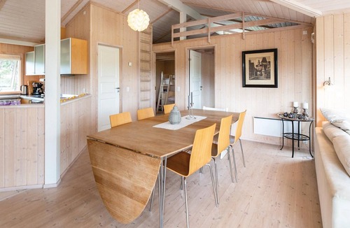 Store Kongsmark House | The cottage in Stillinge Strand has a kitchen open to the living room.