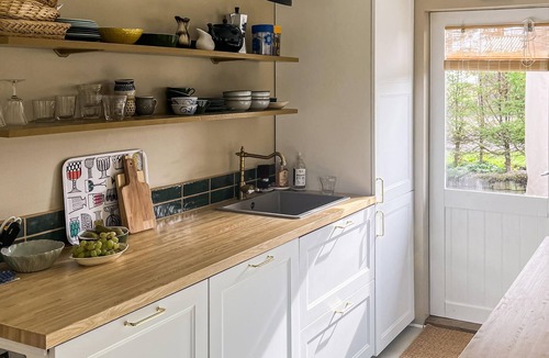 Østerskov House | The cottage is situated on a beautiful natural plot bordering an unfenced marsh.