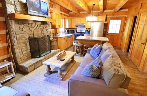 Cherokee Cabin | The Cove: Log Cabin! Pet Friendly! Fire Pit!