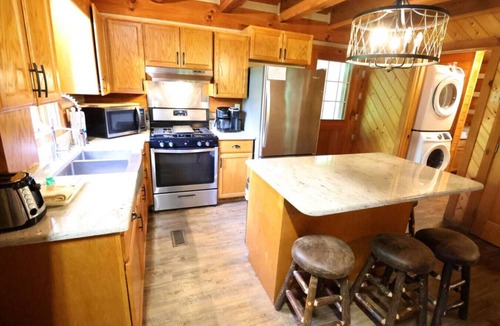 Cherokee Cabin | The Cove: Log Cabin! Pet Friendly! Fire Pit!
