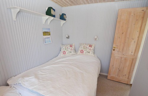 Tørresø House | The cozy cottage is located close to the popular swimming beach of Tørresø, which allows adults and