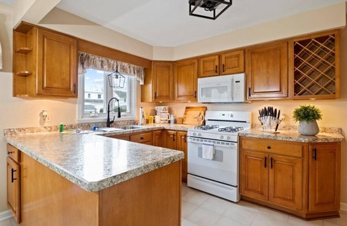 East Irondequoit Villa | The Cozy House & Romantic Fireplace