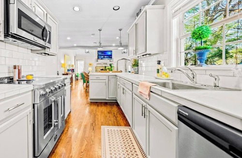Fairway House | The Designer’s Home Fire Pit Vaulted Ceilings