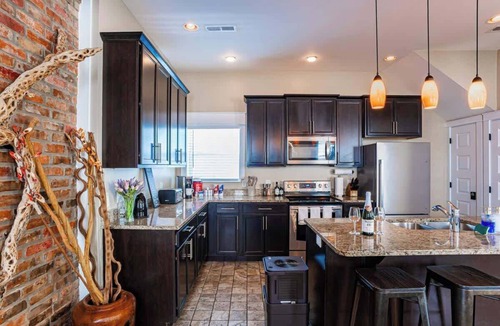 MLK University House | The Eiffel Tower | Games | Cornhole | Bonus Suite!
