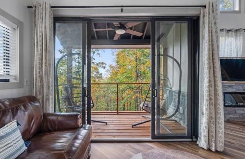 Wildwood House | The Evergreen Treehouse with Winter Views
