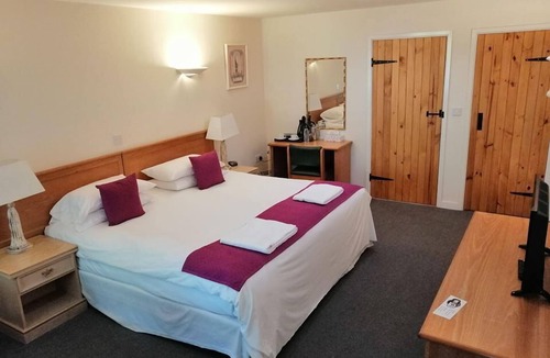 Windmill Hill Hotel | The Flying Fish Stables