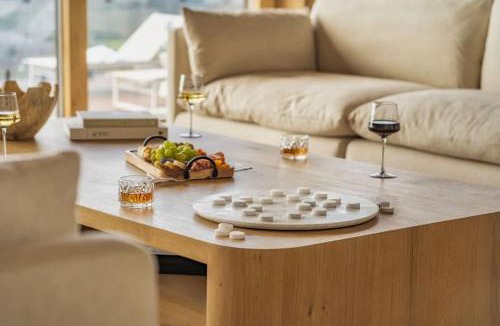 Natures Courtyard Ski Chalet | The Glass Frame - Peak Elegance & Luxury