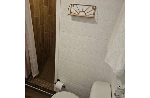 Mineola House | The Green Cabin