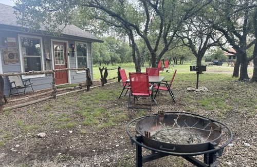 Mountain Home Cabin | The Gunslinger Cabin- Texas Hill Country Western-themed cabin for 4 in the woods near Kerrville & Fredericksburg