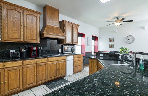 Haslet House | The Hands Down COOLEST Stay in Fort Worth - Active Airplane Hangar