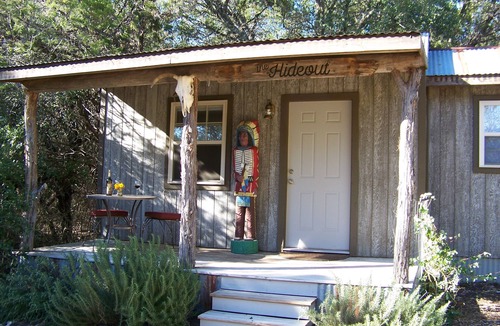 Leander Cabin | The Hideout is a quaint, cozy tiny house/cabin at Round Mountain Ranch