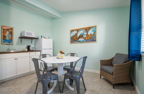 Atlantic Beach Hotel | The Hotel Palms Poolside
