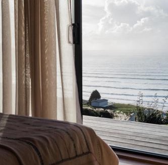 Ahipara Bed & Breakfast | The Huts