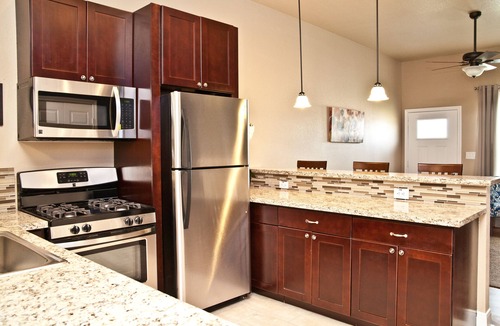 Kyle House | "The Indigo" A little bit country, close to town. New, clean and fresh looking