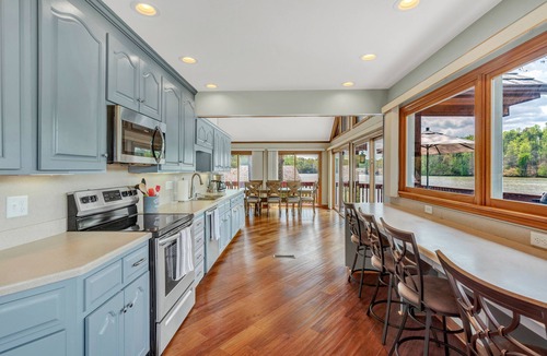 Wirtz House | The Inner Banks - Lakefront chalet with 180-degree lake views, dock & beach