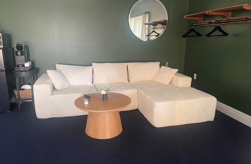 Hector House | The Jade Suite at Diamond on Seneca: King Bed with Lake Views
