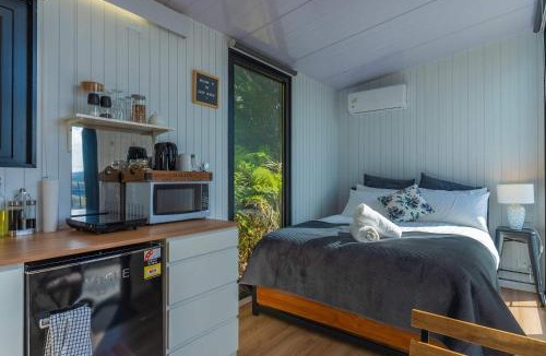 Waitoki House | The Kauri Haven by Tiny Away