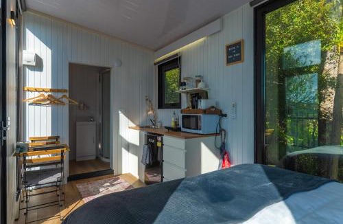 Waitoki House | The Kauri Haven by Tiny Away