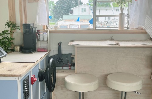 Belleville Boat Rental | The Lilypad: PEC Retreat Waterfront Houseboat Experience Fishing & Glamping