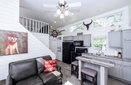 Rockport Cottage | The Live Oak Tiny House with fence