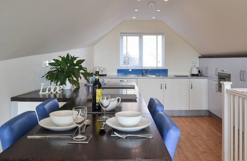 Newton Ferrers Cottage | The lounge is a room with a view.