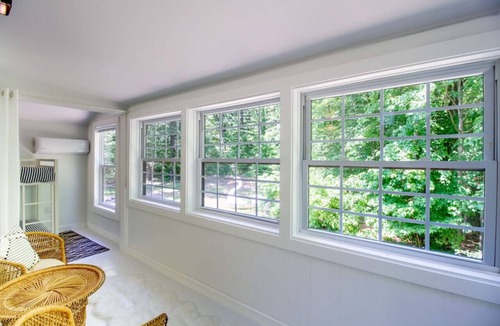 Lowell House | The Love Inn A-Frame Cabin in the woods with pool & firepit, sleeps 19 in Ada