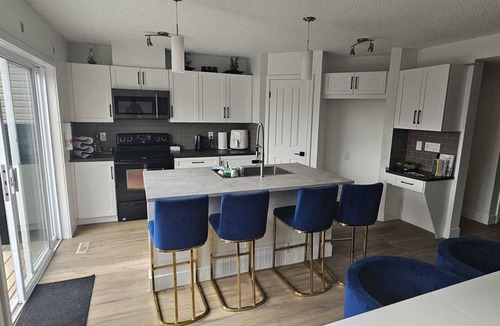 New Brighton House | The Luxury Blue House | Hot Tub + Backyard Oasis