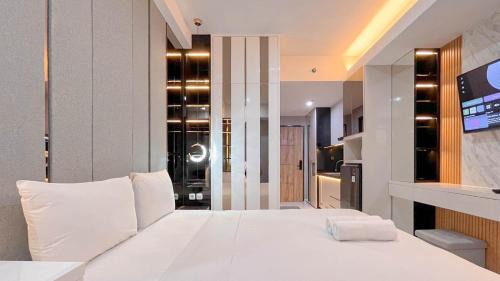 Tetebatu Apartment | The Luxury Studio at Delft Ciputra Makassar Apartment By Travelio