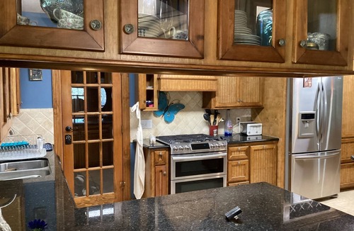 Montgomery House | The Manor 4 BR w/Pool Table, Swimming Pond, and Sand Volleyball