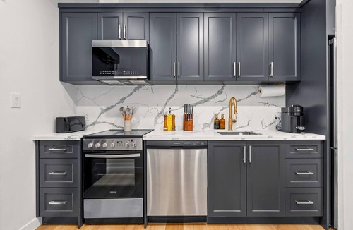 Grange Park Apartment | The McCaul | Newly Designed Group Suite Near FIFA