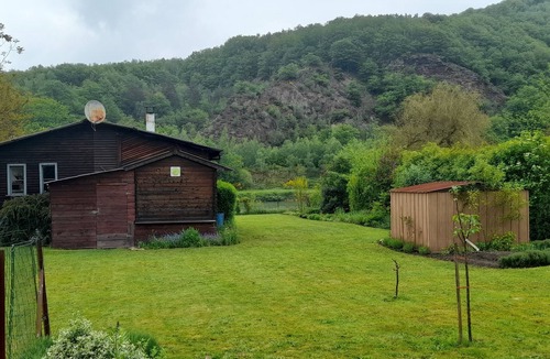 Fepin Ski Chalet | The Meuse is at the end of the garden