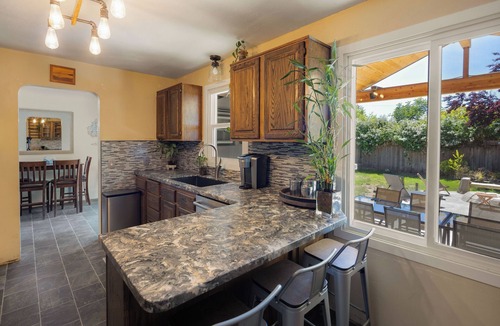 Bethel-Danebo House | The Mixture: Enjoy a hot tub, fire pit, and outdoor dining in Eugene!