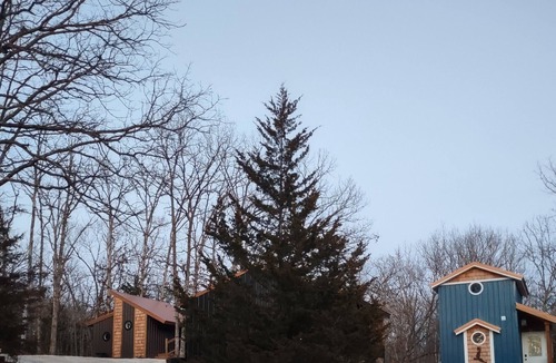 Troy Cabin | The Nest, reconnect with that special someone in our charming birdhouse!