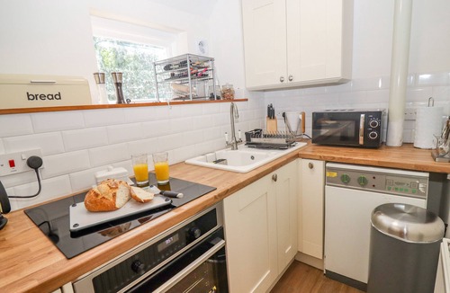 Castle Combe Cottage | THE OLD STABLES, pet friendly, with open fire in Castle Combe