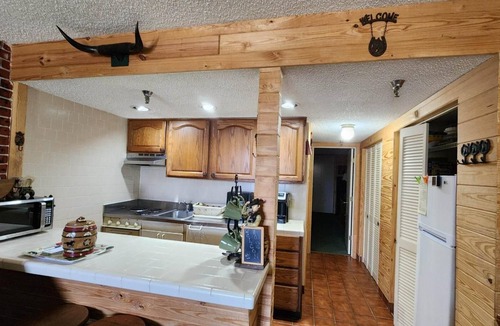 River Ranch Condo | The Old West Rustic Cabin at River Ranch Resort! 103
