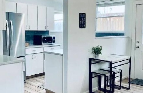 Eden House | The Orange House with heated pool, Sleeps 8