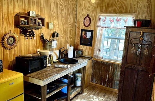 Mountain Home Cabin | The Outpost Cabin- Texas Hill Country Western-themed cabin for 4 in the woods near Kerrville & Fredericksburg