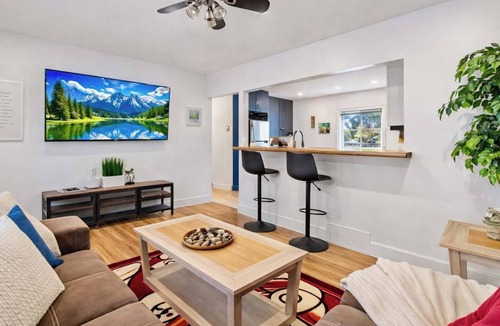 Northwest Calgary House | The Owl PetsOK 3 QueenBD FirePit 3SmartTVs