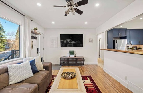 Northwest Calgary House | The Owl PetsOK 3 QueenBD FirePit 3SmartTVs